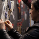 Costume Designer Deborah Cook places fabric samples on the costume boards for Kubo. Image: Steven Wong Jr., Laika Studios / Universal Pictures